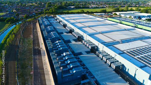 Aerial view of the Google Data Centre Waltham Cross featuring cooling systems and industrial architecture in Cheshunt, England, United Kingdom.
