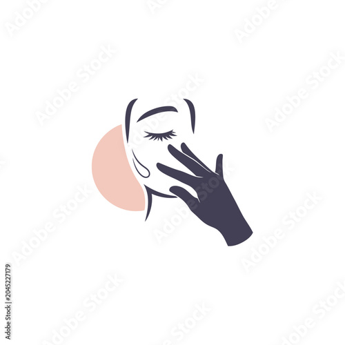 Woman with hand on face.
