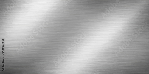 Fotografie A shiny brushed metal texture with a polished silver and grey steel surface crea