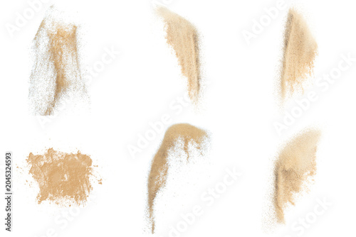 Картината върху платно realistic photograph of natural beige sand pouring and piled elements, isolated on black for creative projects