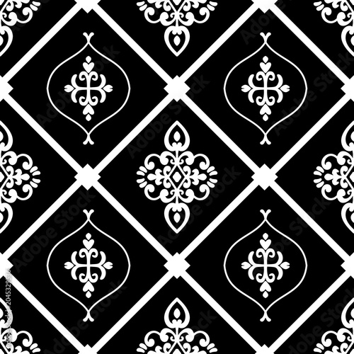 Elegant black and white seamless damask pattern. Classic victorian style motif for textile print, wallpaper background, and luxury fabric design. Symmetrical monochrome geometric ornament.