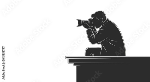 Photos A silhouette of a photographer crouching on a ledge while taking a picture