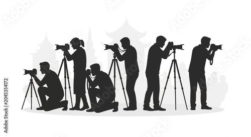 Foto Silhouettes of professional photographers capturing images with cameras and tripods