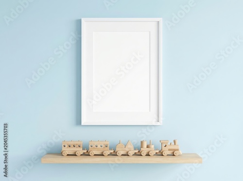 Blank white frame mockup hanging on soft pastel blue nursery wall