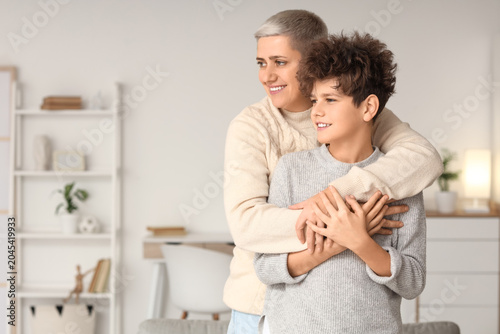 Teenage boy and his mother ...