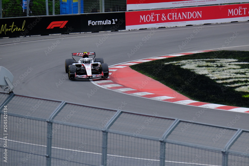 Obraz premium May 24, 2026, Montreal, Canada - Haas Formula 1 car on track by Ocon and Bearman at Circuit Gilles Villeneuve. g.