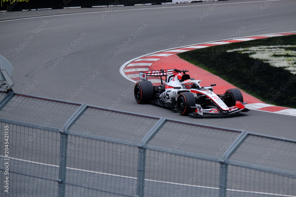Obraz premium May 24, 2026, Montreal, Canada - Haas Formula 1 car on track by Ocon and Bearman at Circuit Gilles Villeneuve. g.