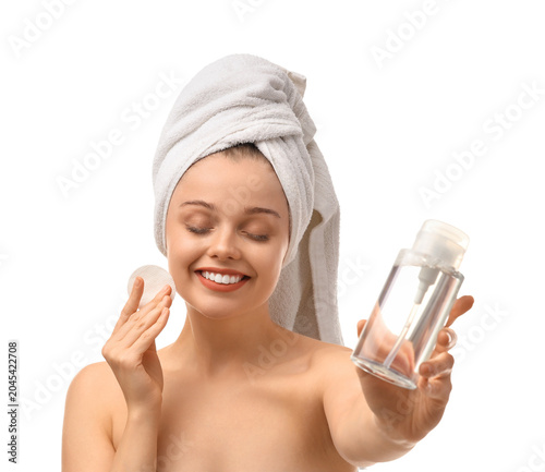 Young woman with bottle of ...