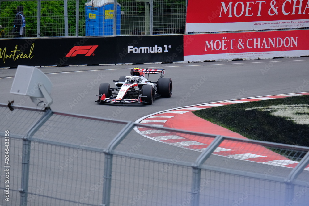Obraz premium May 24, 2026, Montreal, Canada - Haas Formula 1 car on track by Ocon and Bearman at Circuit Gilles Villeneuve. g.