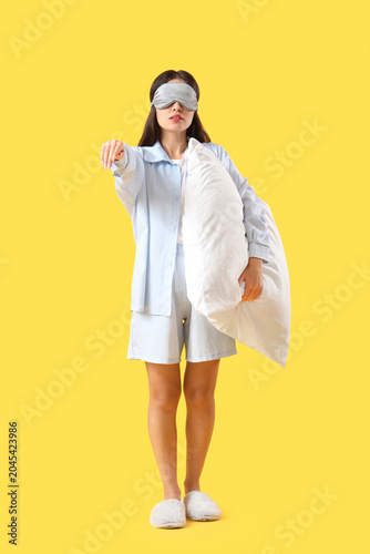 Female sleepwalker in pajam...