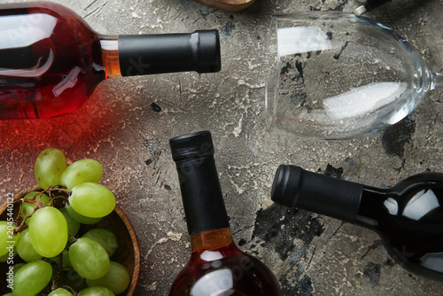 Bottles of wine, glass and ...