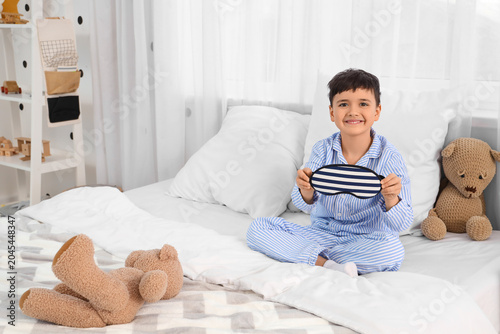 Cute happy little boy with ...