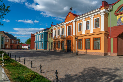 The ancient building of the Monastery Hotel at the Holy Dormition Pskovo-Pechersky Monastery on a sunny summer day, Pechory, Pskov Region, Russia