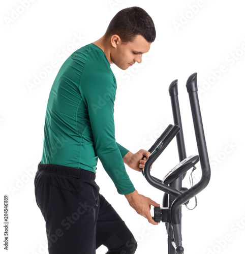 Sporty young man training o...
