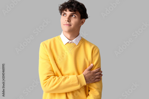 Portrait of pondering young...
