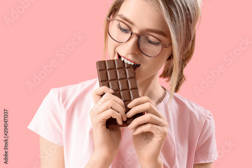 Young woman eating tasty ch...