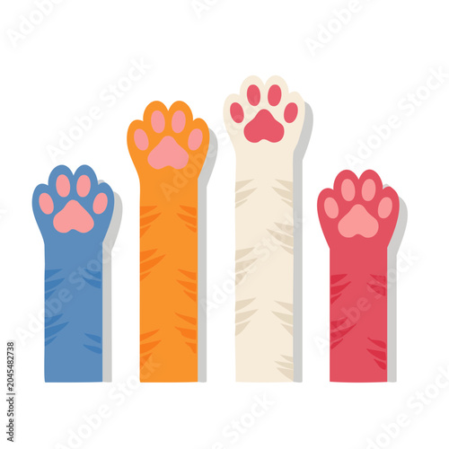 Four colorful cat paws raised up