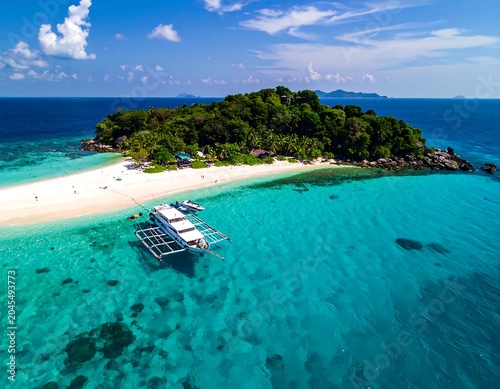 Tropical island view featuring a boat in clear turquoise waters and a white sandy beach on a sunny day