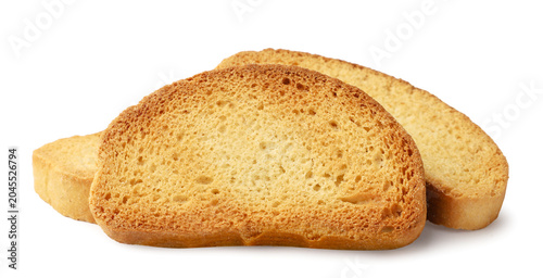 Photos Pile of bread rusks close-up on a white background. Isolated