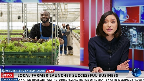 Foto Media broadcaster presents new farming business, talking about farmer growing natural bio produce in own greenhouse