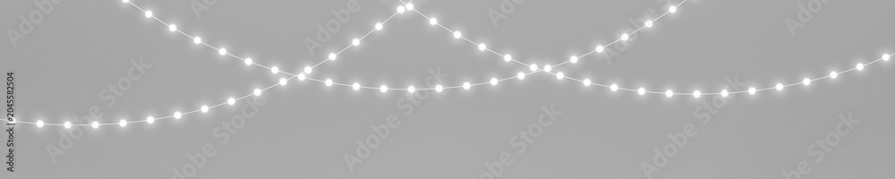 Fototapeta premium Silver Xmas garland lights PNG. Realistic glowing LED lamps with luminous white bulb decoration. Christmas string lights isolated on transparent background.