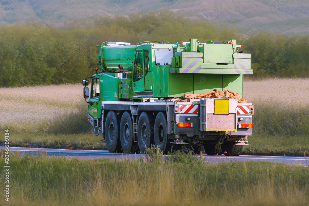 Fototapeta premium Mobile elevated work platform truck on countryside roadside