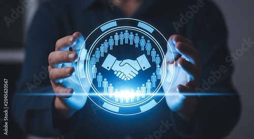 Businessman hands holding a glowing circular digital interface with a handshake surrounded by human silhouettes representing global networking