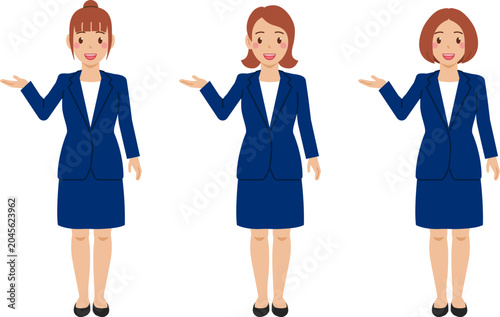 [全身] 「こちらへ」とカットソーにネイビースカートスーツの若い女性