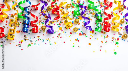 Festive Celebration Colorful Streamers and Confetti on White Background.