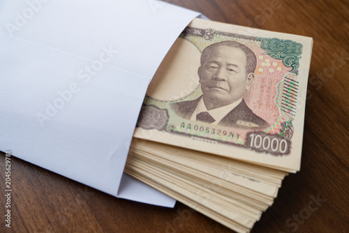 Obraz na płótnie 白封筒に入った百万円