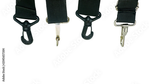 Konstfotografi Four clasp carabiners for fastening with a textile strap on ocher orange