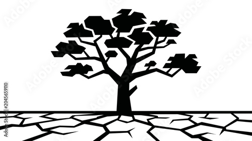 Lone tree silhouette on dry cracked earth during extreme drought.