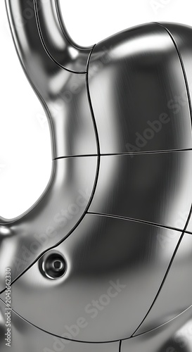 Shiny metallic puzzle piece close-up.