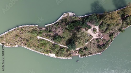 Aerial Top View of Small Island with Walking Paths in Park Lake