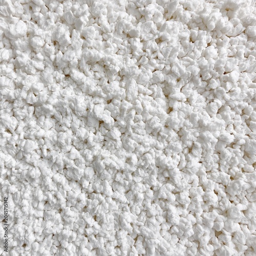 Texture of White Material Spread on a Flat Surface During Daytime