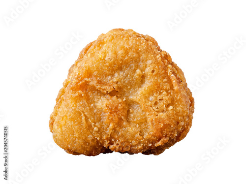 Принти на полотні Irregularly shaped golden-fried chicken nugget with a crunchy breading, isolated on a transparent background