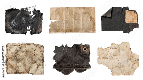 Photos Authentic collection of distressed and aged fabric and paper fragments with grunge textures, isolated on transparent