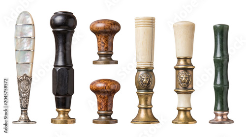 Tableau sur toile Diverse assortment of antique wax seal stamps with various decorative handles isolated on transparent background