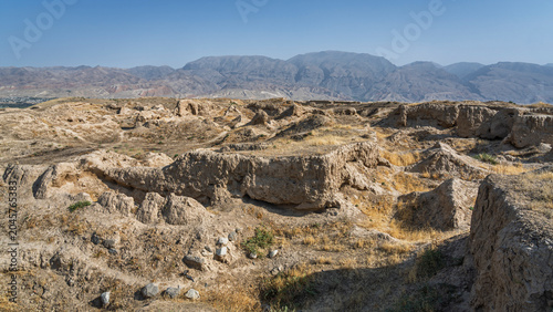 Scenic summer landscape view of ruins of ancient silk road sogdian city of Penjikent in Zeravshan valley, Panjakent, Sughd, Tajikistan