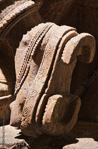 Close-up view on Statue Of Krishna Playing Flute. He Is God Of Protection, Compassion, Tenderness, And Love. Krishna Is Major Deity In Hinduism