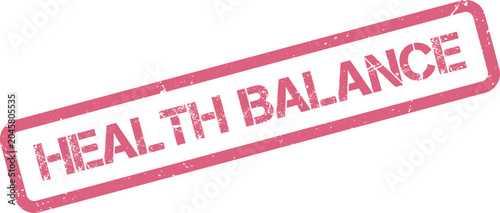 Фотография Promoting optimal health balance message on a distressed pink rubber stamp for h