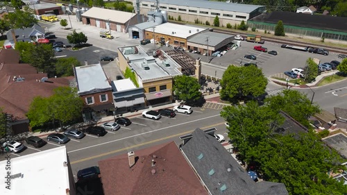 High-Angle Drone Footage of Small-Town Main Street on a Sunny Summer Day