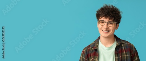 Smiling teenage boy with cu...