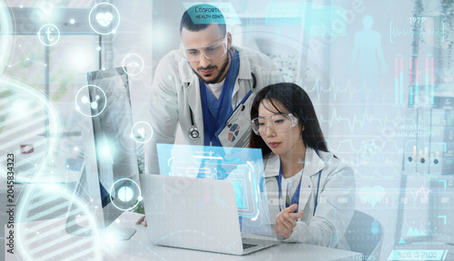 Doctors analyzing scientifi...