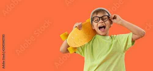 Little boy with skateboard ...