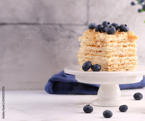 a sweet, delicious slice of cake with fresh blueberries