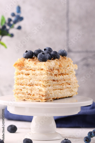 a sweet, delicious slice of cake with fresh blueberries