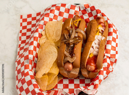 Canvas Print hot dogs with onions, ketch up and mustard