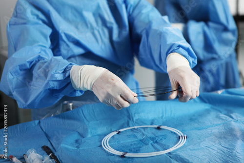 Bild auf Leinwand Removal of blood clots through small holes