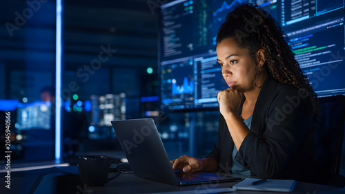 Brilliant woman solving critical problem during intense late night session
